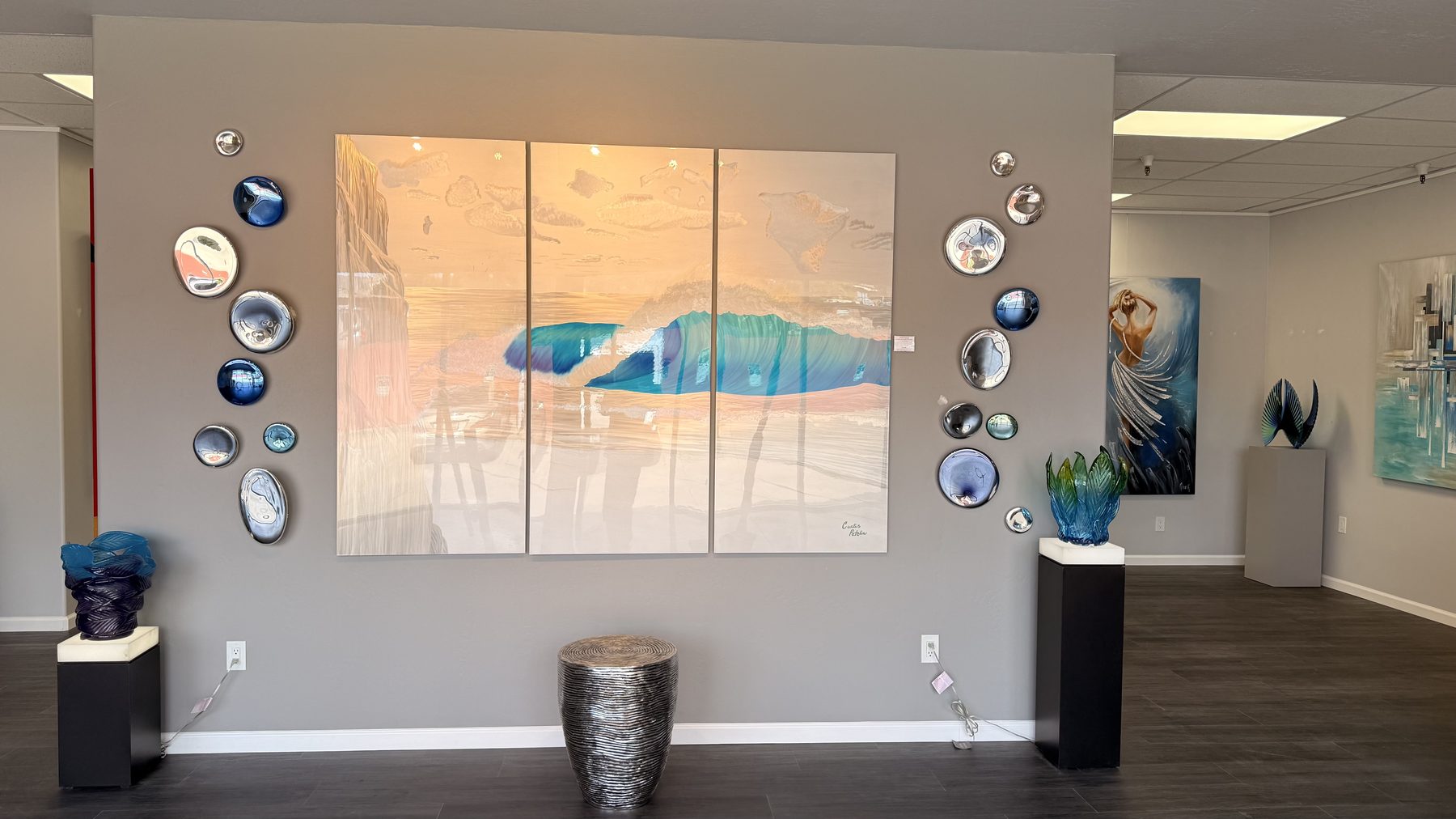 Inside the Creative Gateways Showroom in West Sedona: Nina K triptych with art glass and sculpture